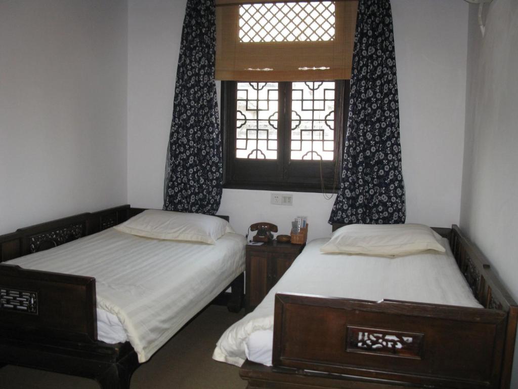 XI Di Travel Lodge Yi (Anhui) Ruang foto